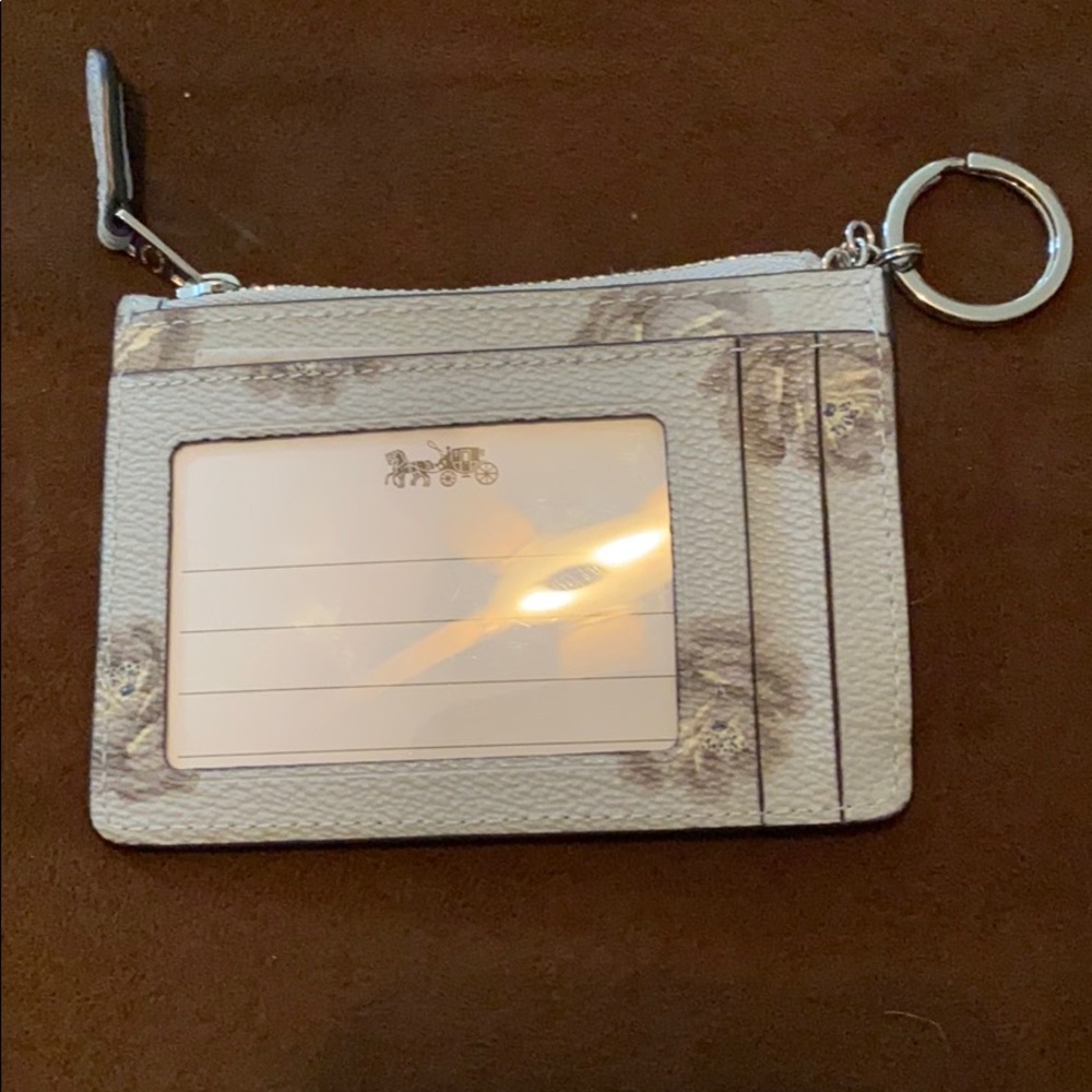 Coach light blue with gray flowers card holder